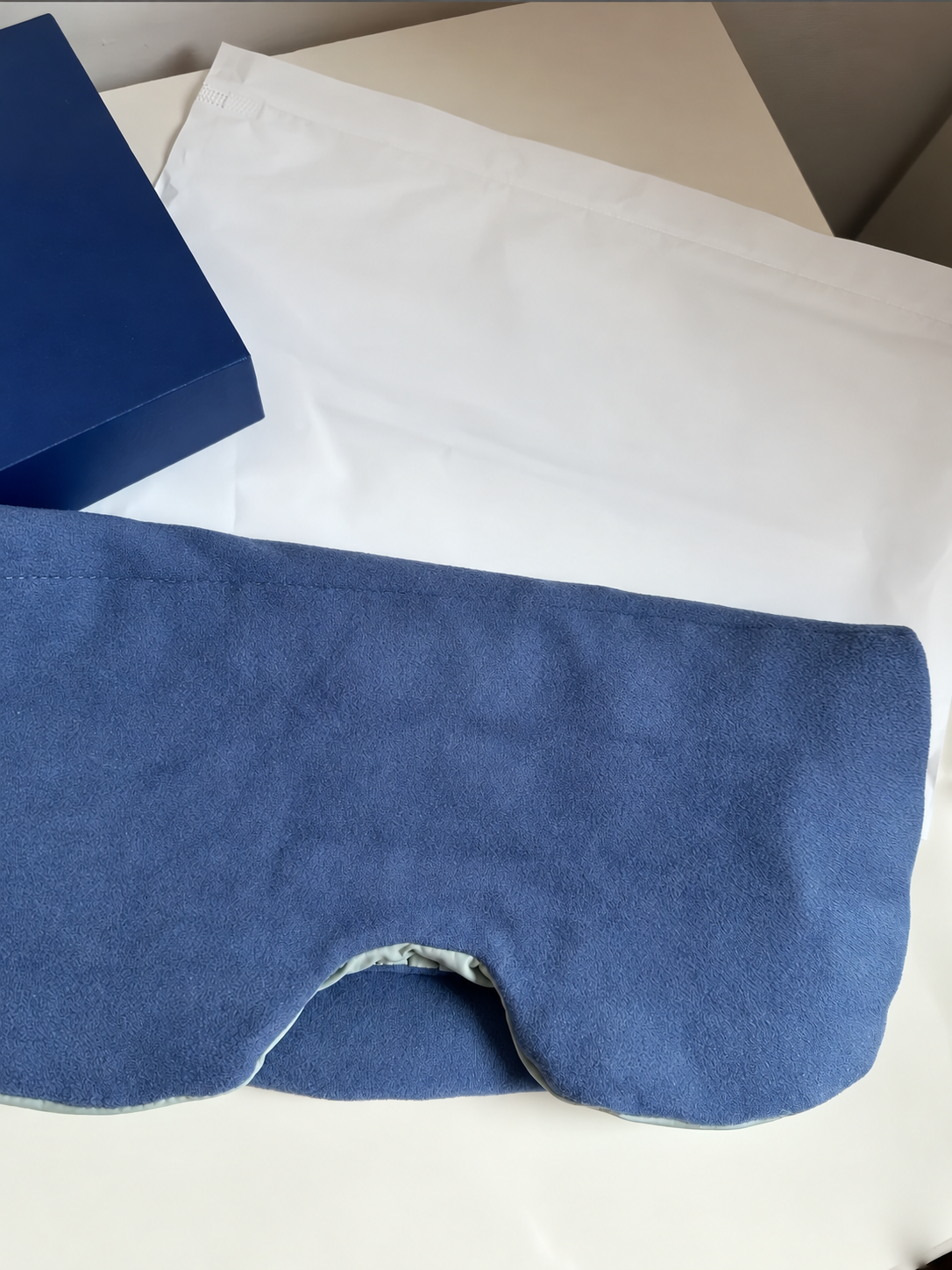 Blue weighted sleep hood product photo